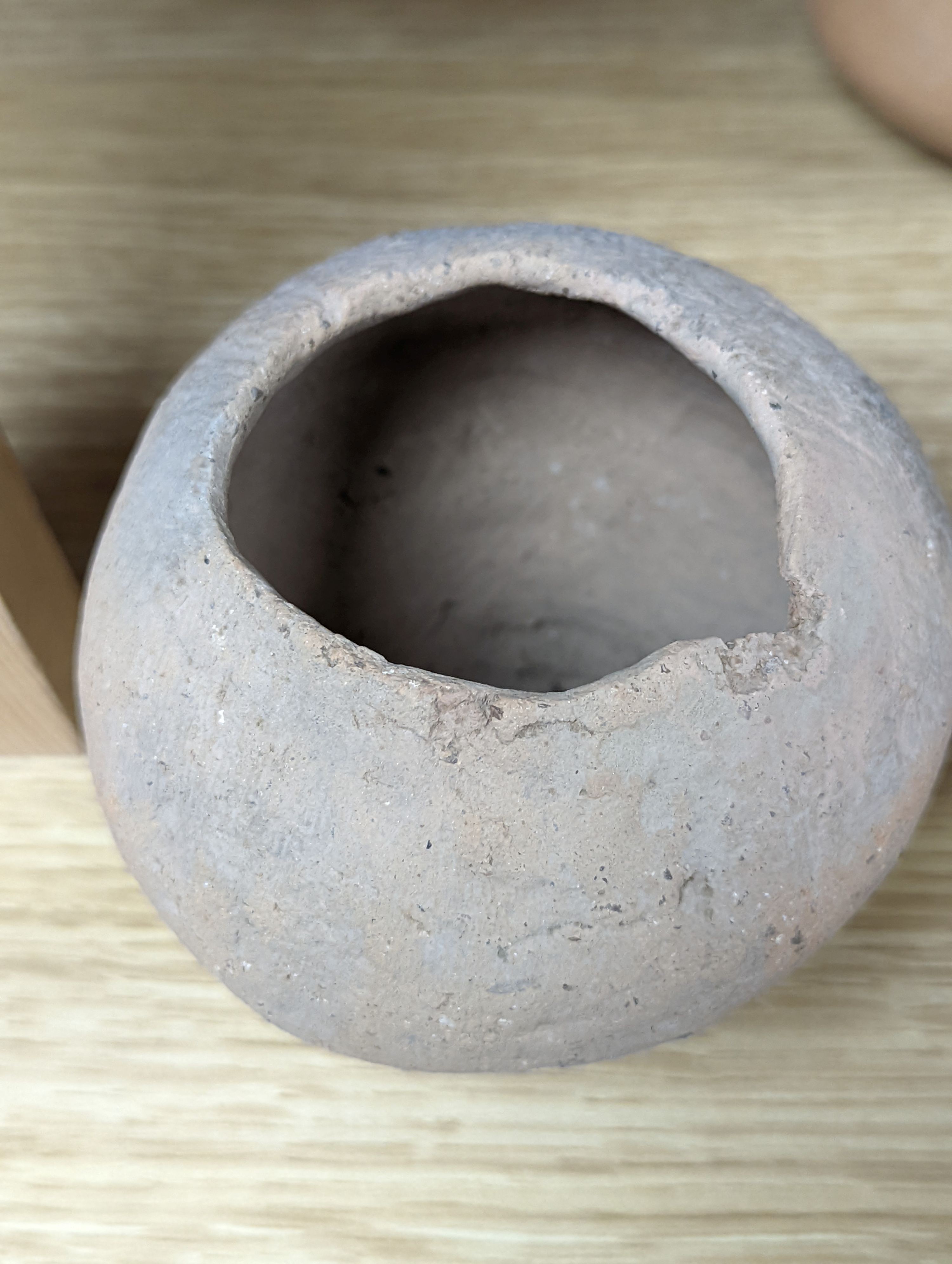 Four Chinese Neolithic pottery vessels, 11cm